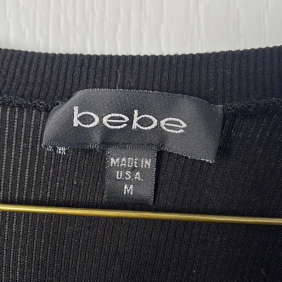 Bebe deep-V with 3/4 sleeve & sparkle button detail. - Picture 4 of 6